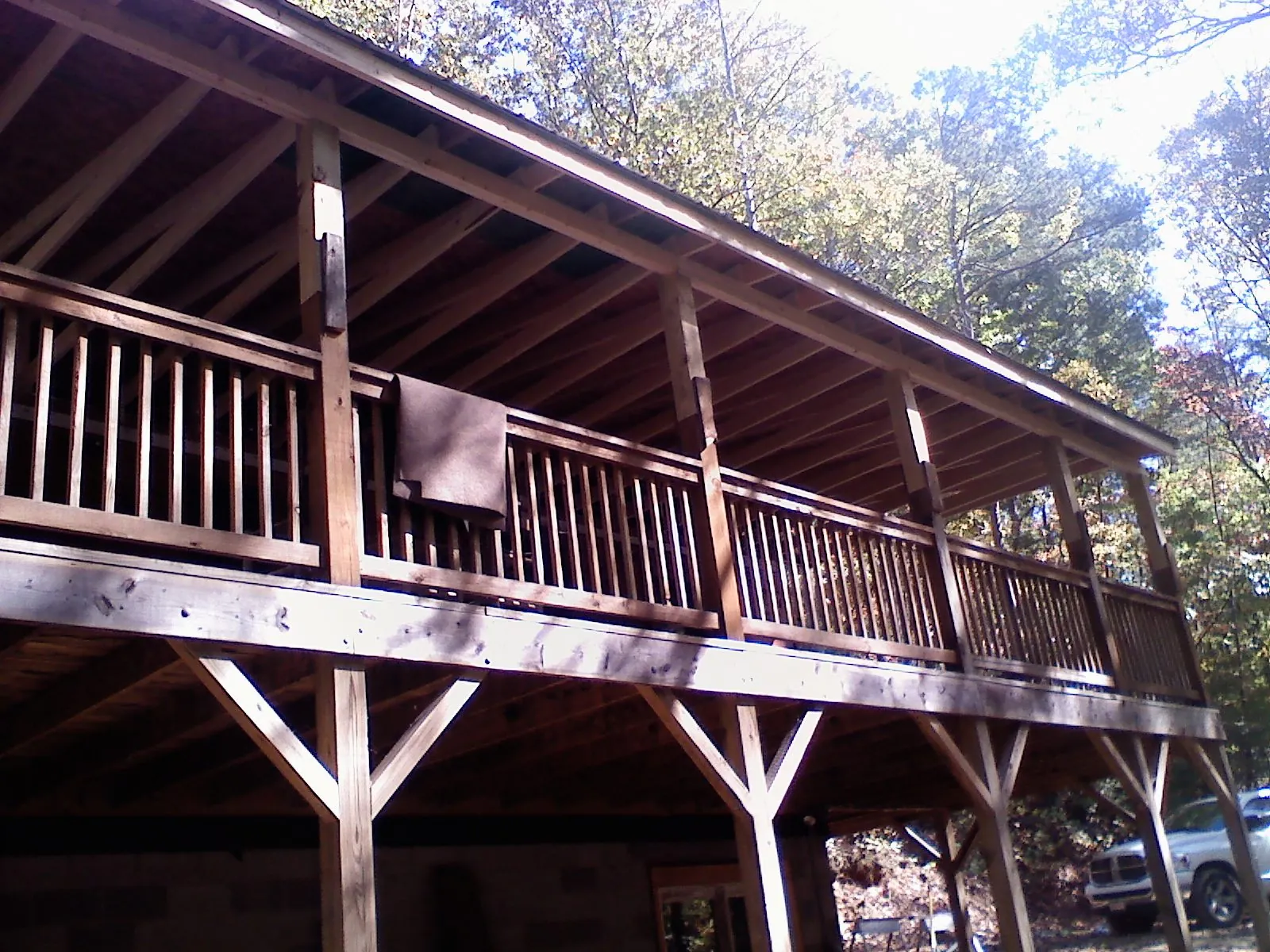 Timber framing under a new elevated porch and deck — Roof Leak Repair in Mystic by Roofing Brothers